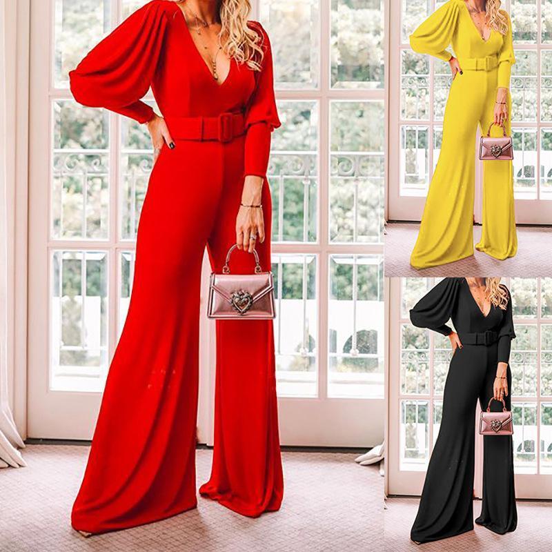 Solid jumpsuit with V-neck, lantern sleeves, and waistband in red, yellow, and black for women.